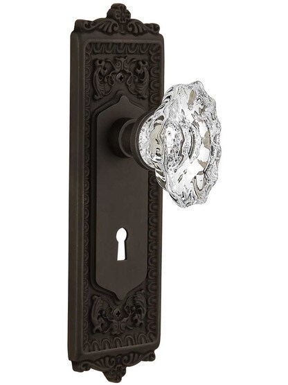 Egg and Dart Design Door Set with Keyhole and Chateau Crystal Glass Knobs in Oil-Rubbed Bronze.